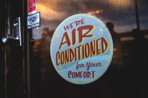 AC sign on door front