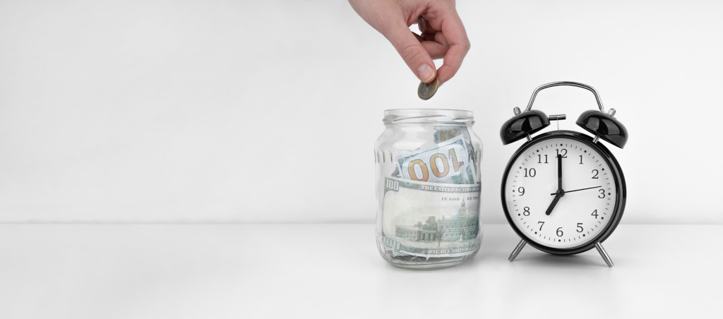 Person using a jar to save money